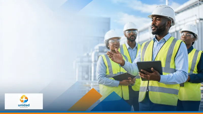QHSE consultant leading an industrial site discussion
